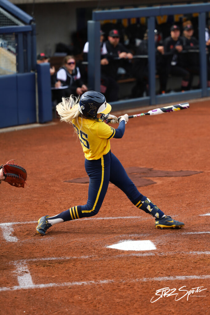 university of michigan softball swing strz photography
